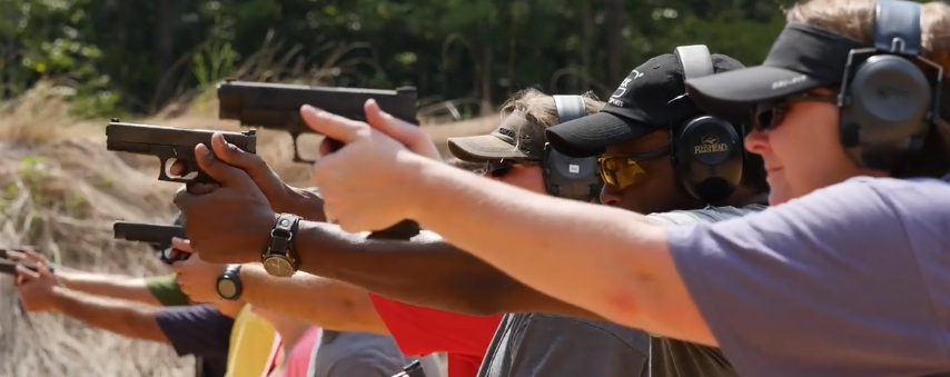 Gunowners training with their pistols