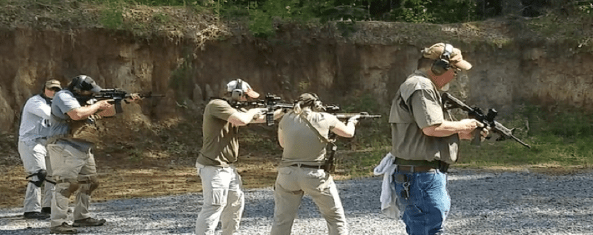 Men learning how to use rifles