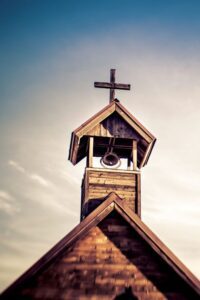 A church bell and a cross