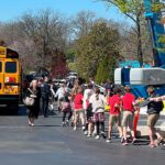 Kids going to ride a school bus