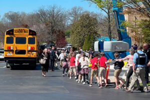 Kids going to ride a school bus